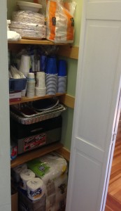 Orderly organized storage closet with paper goods on shelves. Everything has a home. Easy to see what he has and can use on the spot before going shopping. 