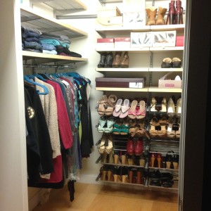 After clothes and shoes found its way home. Dresses on the hanging rod on the left side. Pants on the first shelf above the rod and then boxes on other shelves upward. Shoes are on display from floor to ceiling. The floor is completely cleared and free of clutter. 