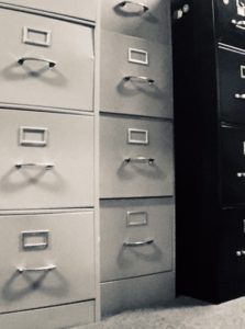 3 filing cabinets lined up