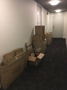 boxes contained in boxes after the unpack in the hallway to go out. 